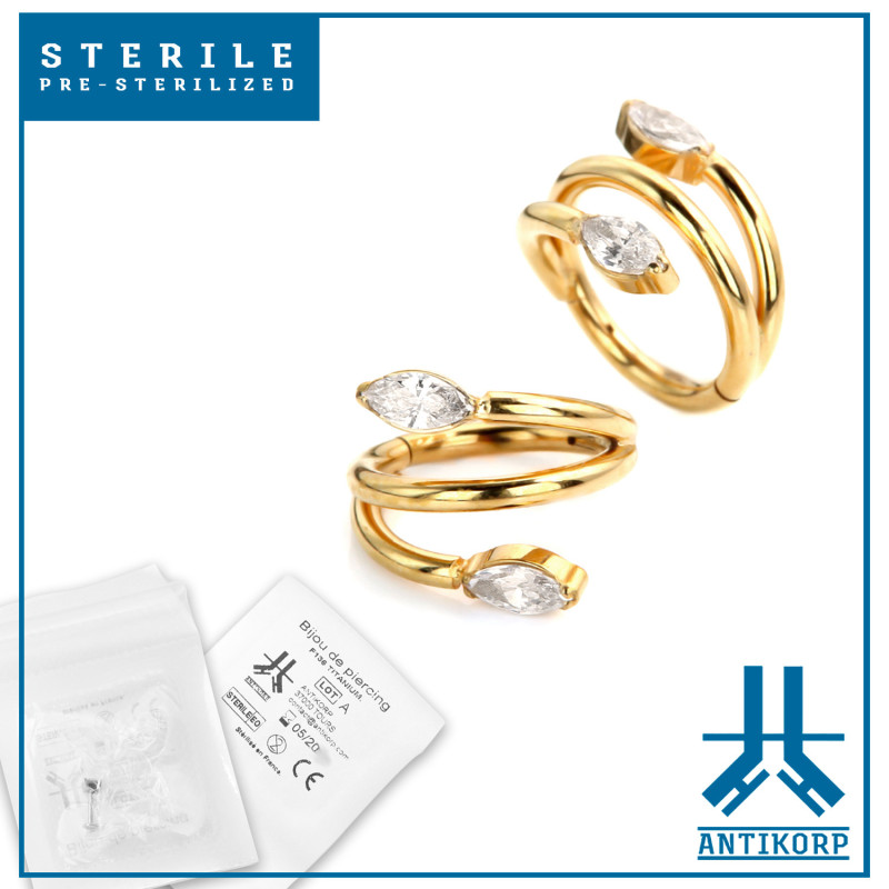 Anello Clicker Titanio Oro Sterile Twist Strass